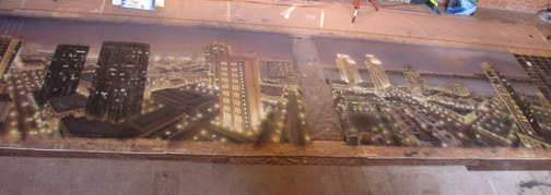 cityscape mural complete - ladder shot