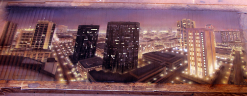 finished left panel of mural on the floor of the studio
